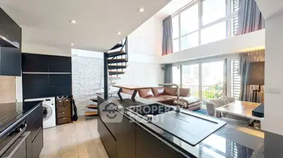 Modern duplex apartment with open kitchen and spiral staircase, featuring large windows and stylish decor.