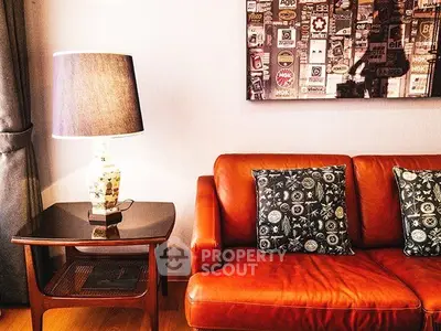 Stylish living room with leather sofa and unique decor