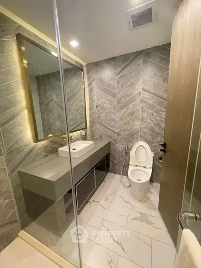 Modern bathroom with sleek design and elegant tile work