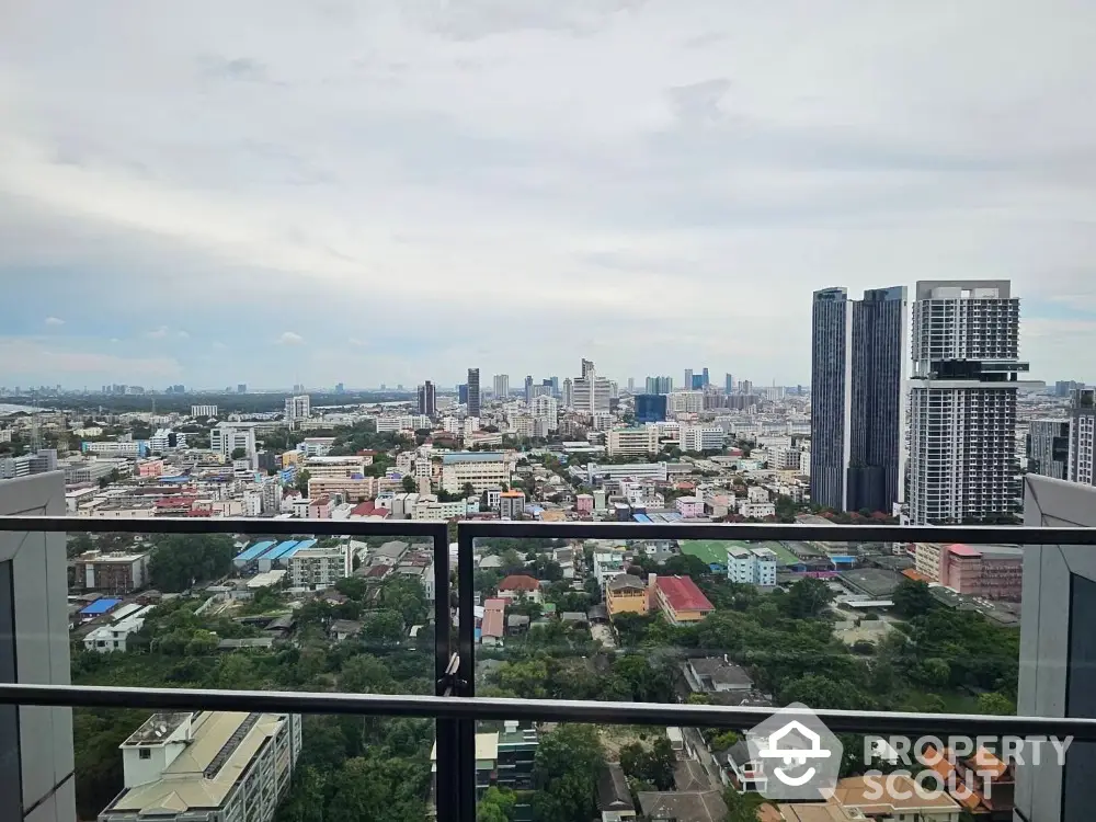 Stunning cityscape view from high-rise balcony with modern skyline