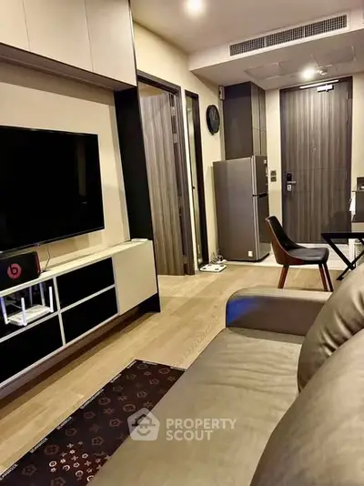 Modern living room with sleek furniture and entertainment setup