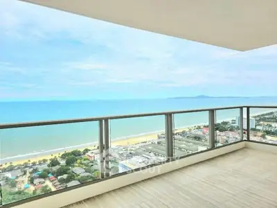 Stunning beachfront balcony with panoramic ocean views and spacious layout.