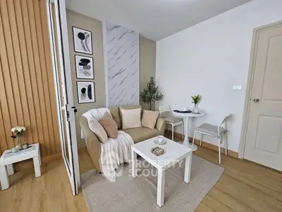 Chic and cozy living room with modern decor and neutral tones, perfect for relaxation and entertaining.