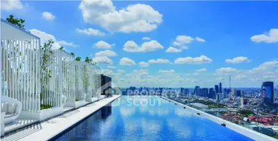Stunning rooftop infinity pool with panoramic city skyline view