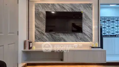 Modern living room with sleek TV setup and stylish decor