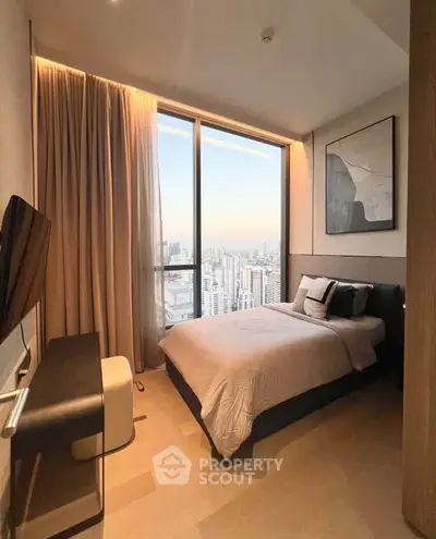 Luxurious bedroom with stunning city view and modern decor