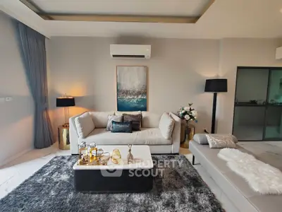 Luxurious modern living room with elegant decor and plush seating