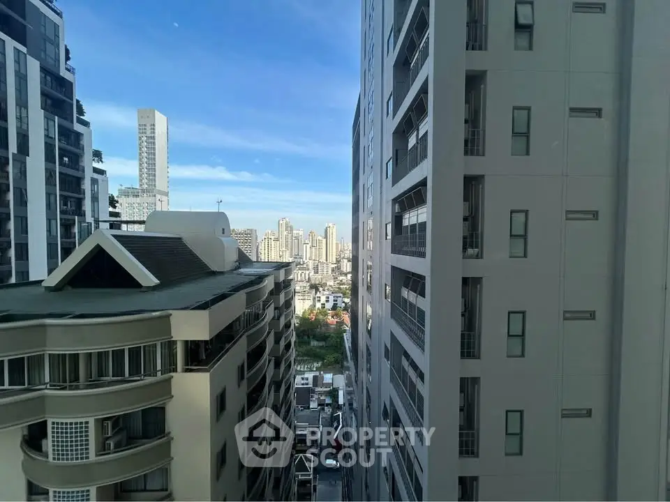 Stunning cityscape view between modern high-rise buildings in urban setting.