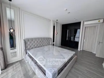 Luxurious modern bedroom with elegant decor and spacious layout