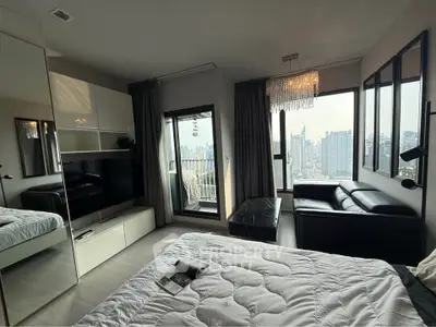 Luxurious bedroom with stunning city view and elegant decor