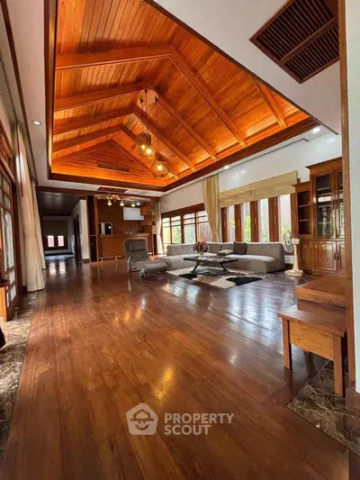 Luxurious wooden ceiling living room with elegant decor and spacious layout