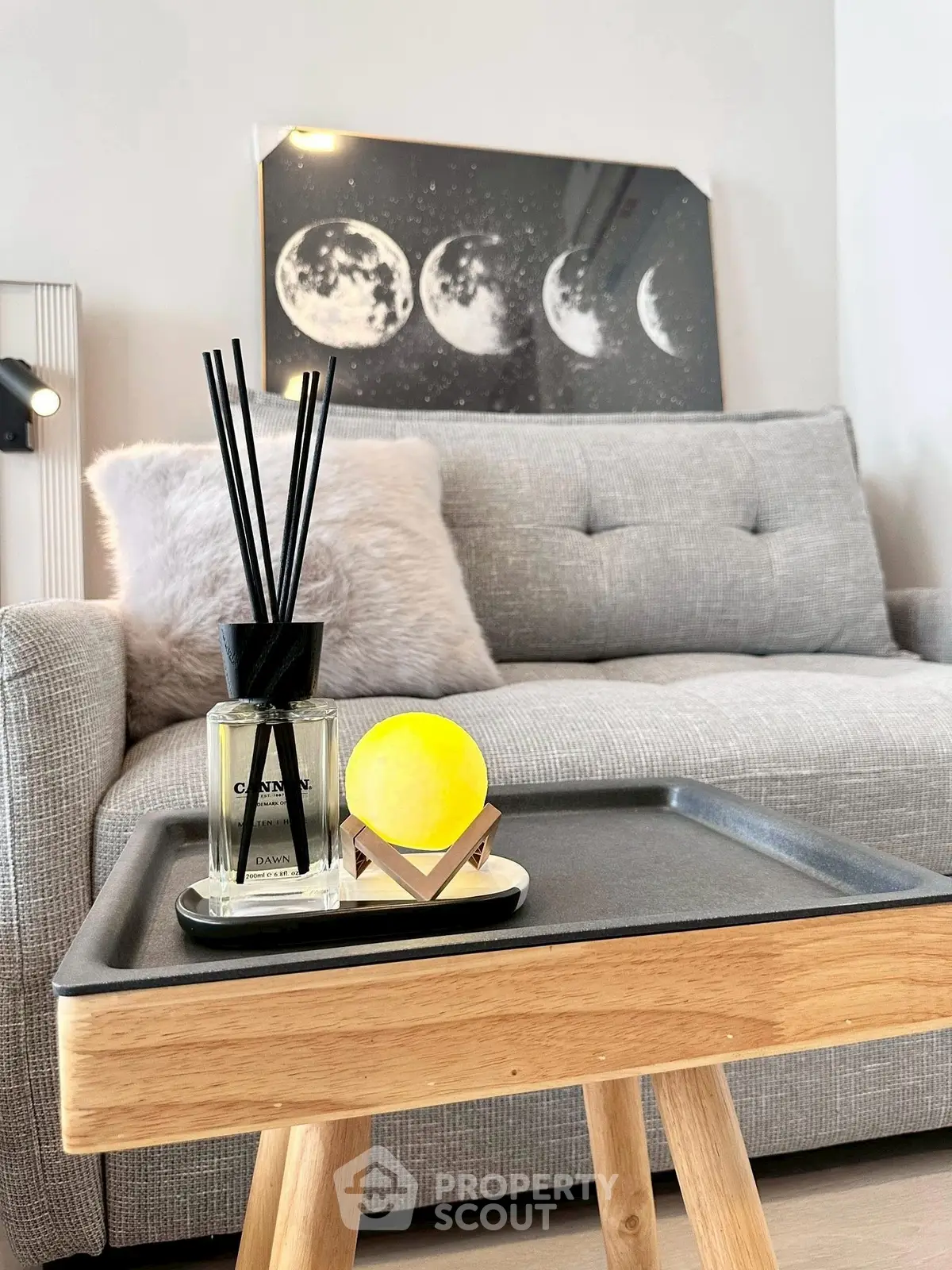 Stylish living room with modern decor and cozy gray sofa