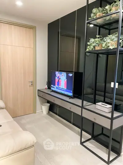 Modern living room with sleek TV unit and stylish decor