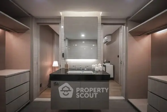 Luxurious modern bathroom with sleek vanity and ambient lighting