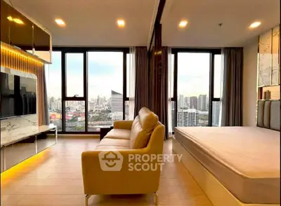 Luxurious modern bedroom with stunning city view and elegant furnishings.