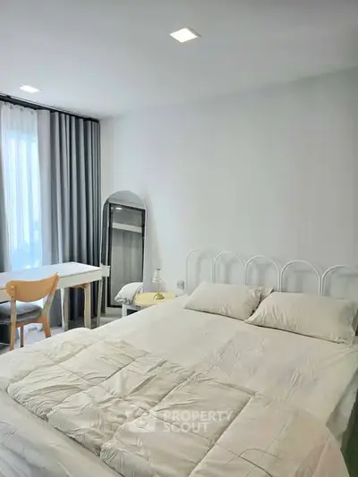 Cozy bedroom with modern decor and natural light