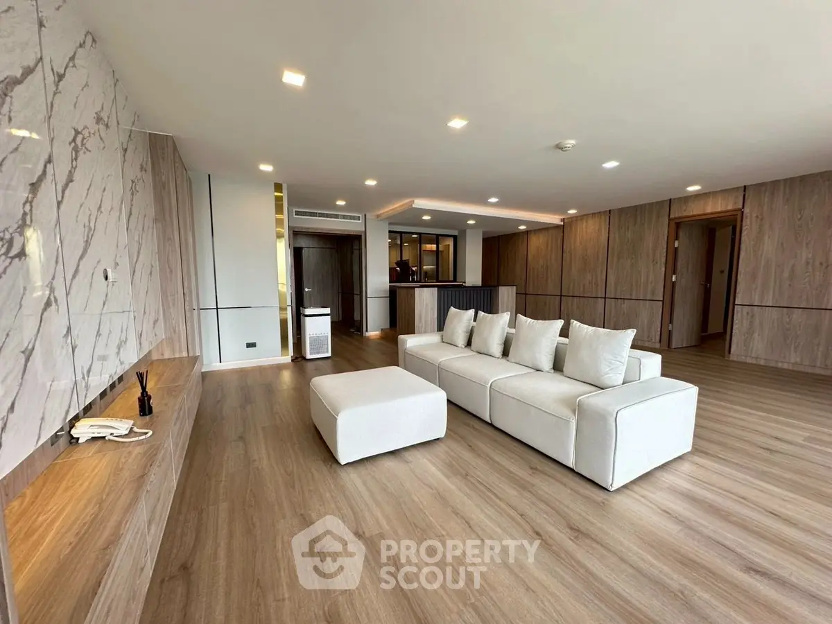Spacious modern living room with elegant decor and open layout