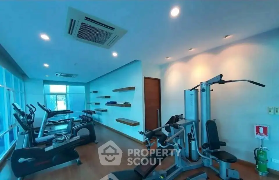 Modern gym with state-of-the-art fitness equipment and sleek design