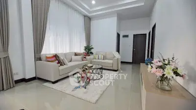 Spacious modern living room with elegant decor and natural light