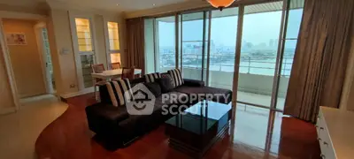 Spacious living room with stunning city view and elegant decor