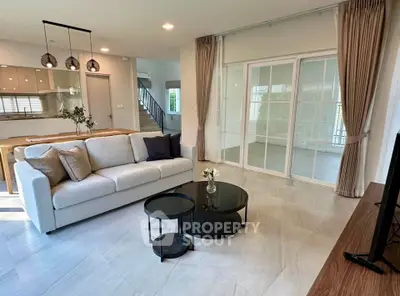 Spacious modern living room with elegant decor and natural light
