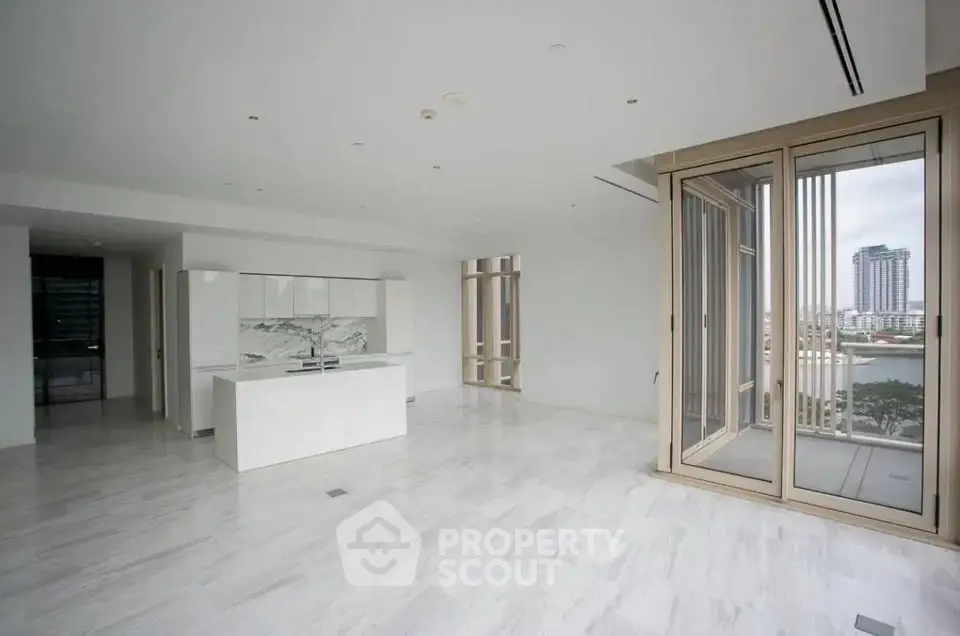 Luxurious open-plan living room with marble flooring and stunning city view from large windows.
