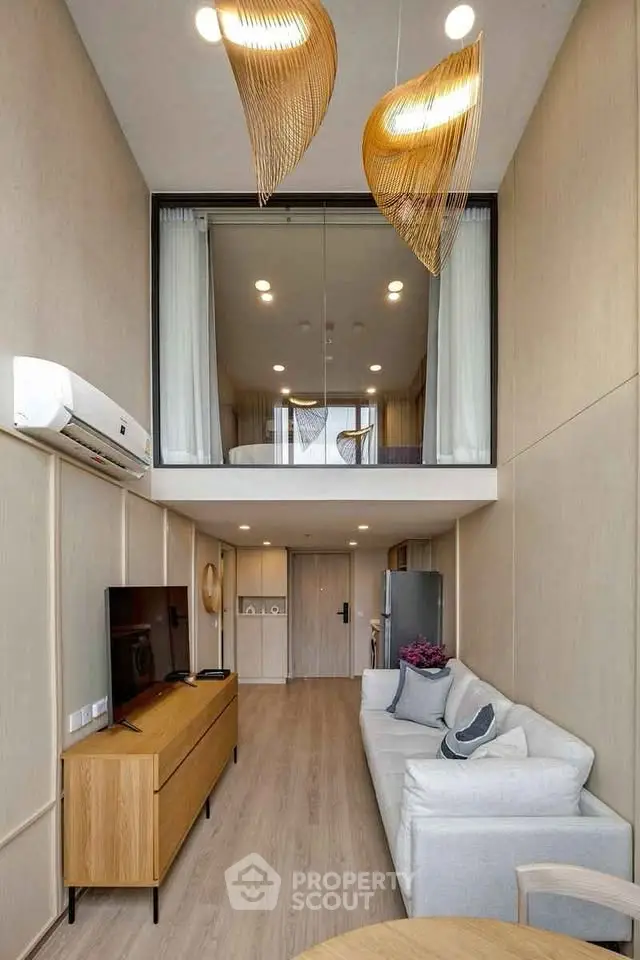 Modern loft apartment with stylish living room and mezzanine bedroom