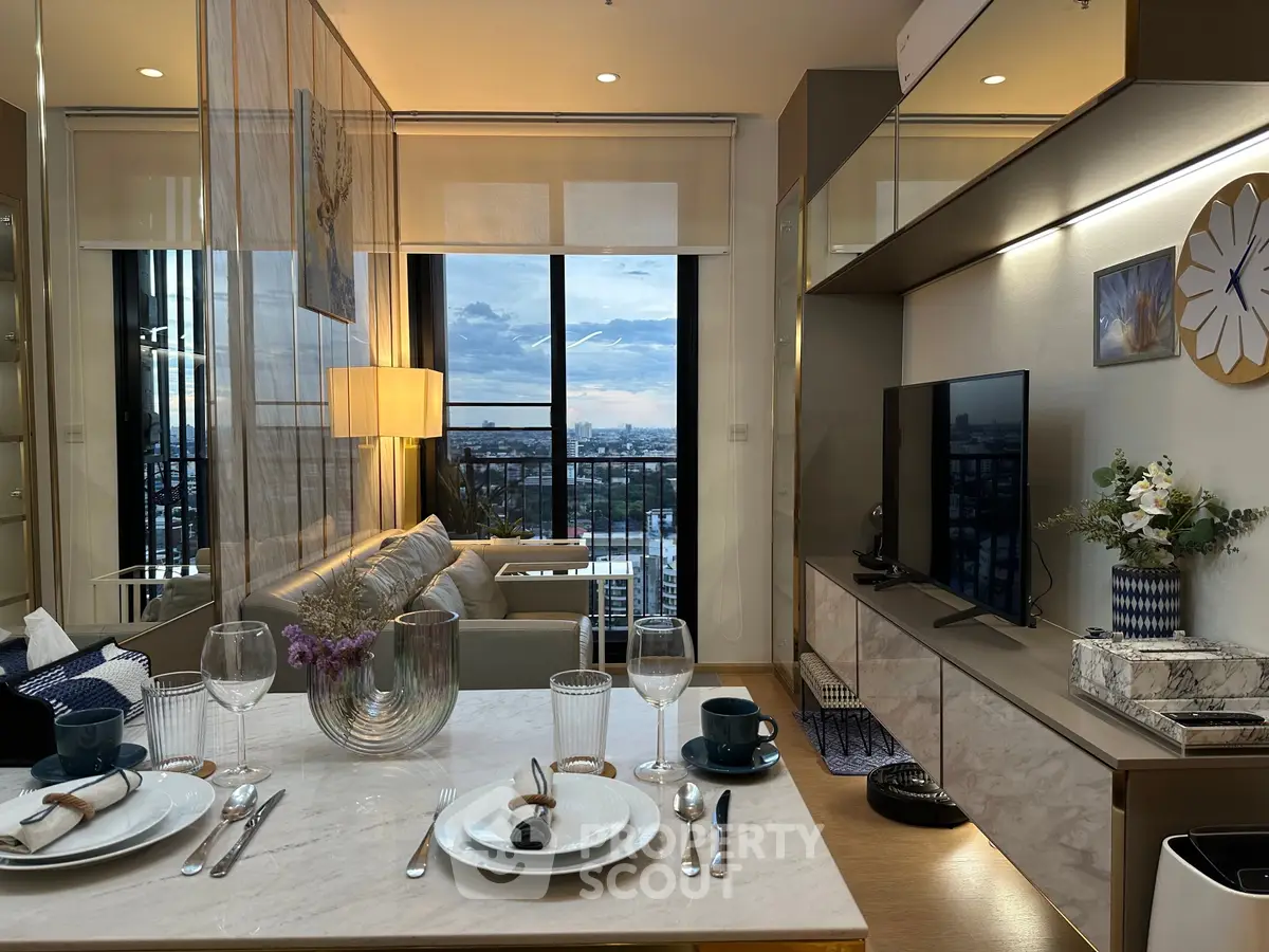 Modern living room with elegant dining setup and city view, featuring stylish decor and open layout.