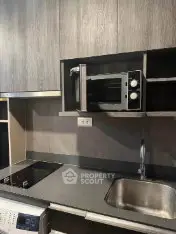 Modern kitchen with sleek appliances and minimalist design