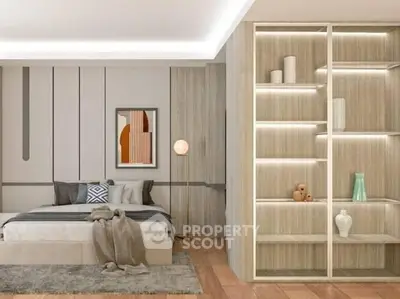 Modern bedroom with stylish decor and built-in shelving, featuring cozy lighting and contemporary artwork.