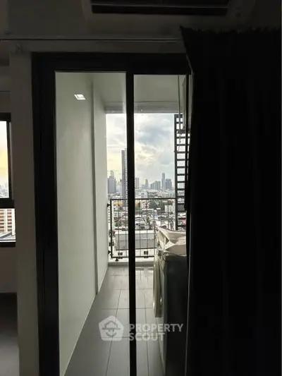 Modern apartment balcony with city skyline view, perfect for urban living enthusiasts.