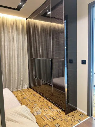 Luxurious bedroom with modern wardrobe and elegant decor