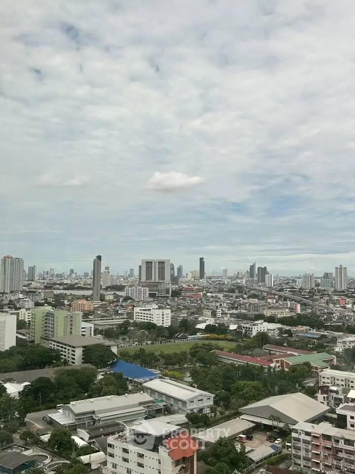 Stunning cityscape view showcasing a vibrant urban skyline with diverse architecture and lush greenery.