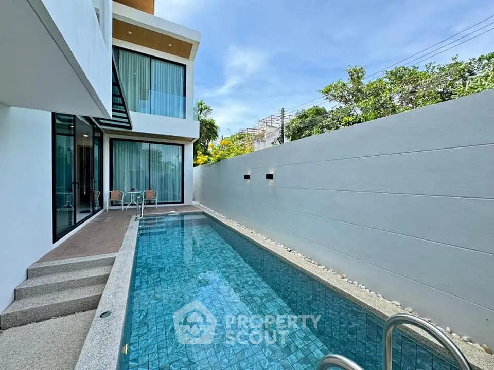 Modern luxury villa with private pool and stylish exterior design
