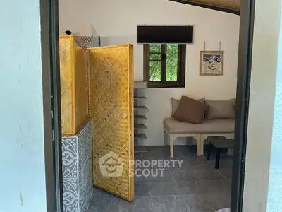 Cozy interior with bamboo accents and modern decor, perfect for relaxation.