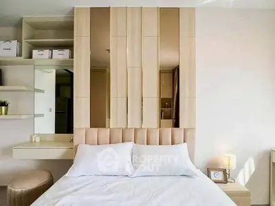 Modern bedroom with stylish headboard and elegant decor