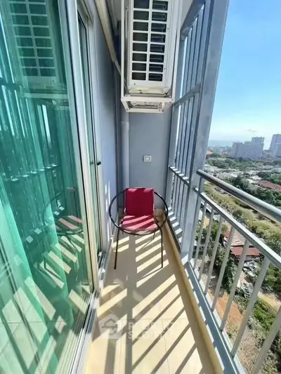 Charming balcony with city view, perfect for relaxation and enjoying the outdoors.