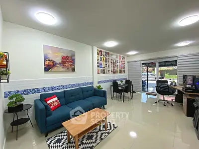 Spacious modern living room with stylish decor and natural light