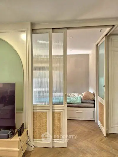 Modern apartment with sliding doors and cozy bedroom