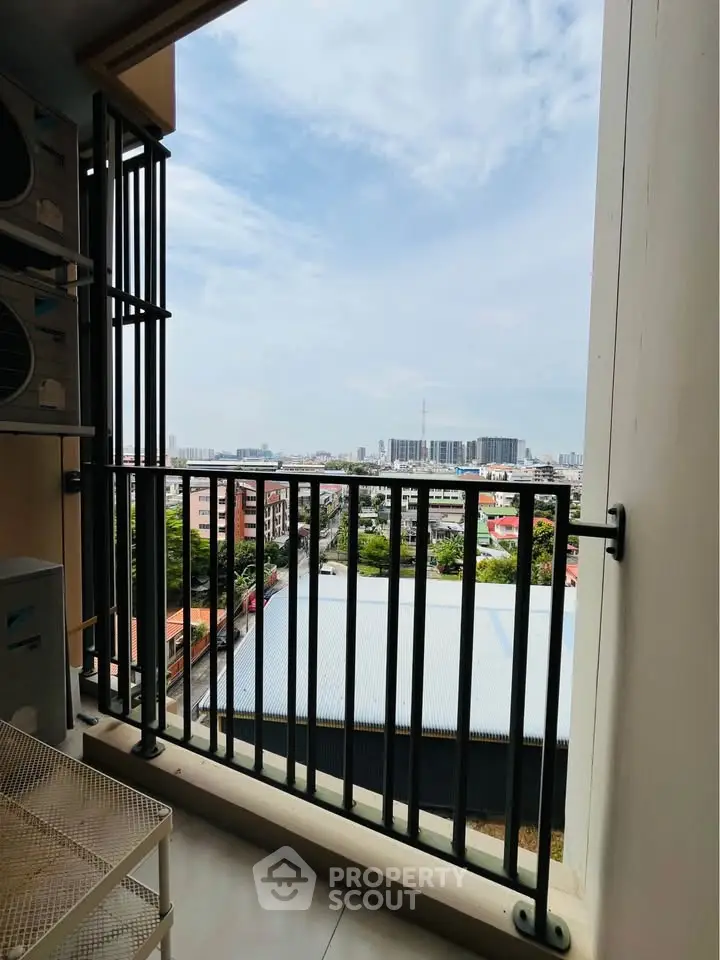Stunning cityscape view from a modern apartment balcony, perfect for urban living.