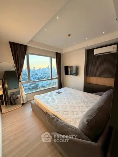 Modern bedroom with city view and stylish decor