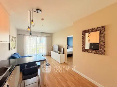 Modern open-plan living room with stylish decor and natural light