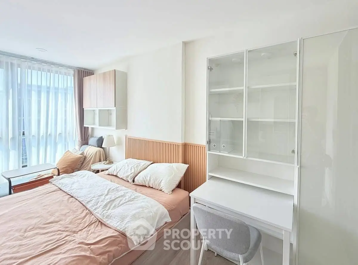 Bright and cozy bedroom with modern furniture and natural light