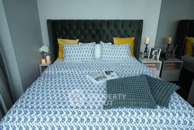 Luxurious bedroom with elegant decor and plush bedding, perfect for relaxation and comfort.