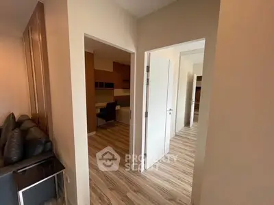 Modern apartment interior with wooden flooring and cozy living space