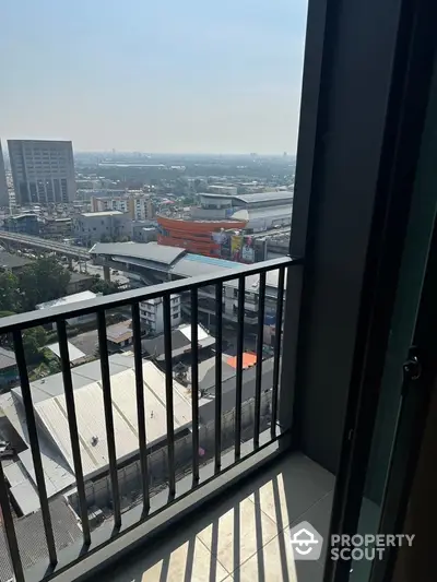 Stunning city view from high-rise balcony with panoramic skyline