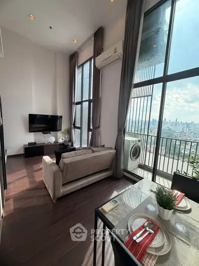 Stunning high-rise living room with floor-to-ceiling windows and city skyline view.