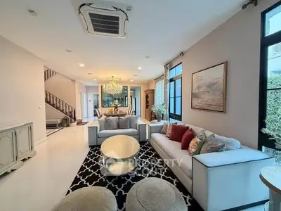 Luxurious living room with elegant decor and modern furniture in a spacious open layout.