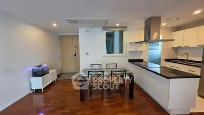 Modern kitchen with open layout and sleek dining area