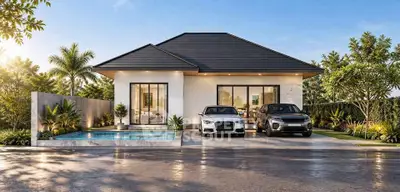 Modern single-story house with sleek design, pool, and two-car driveway, surrounded by lush greenery.